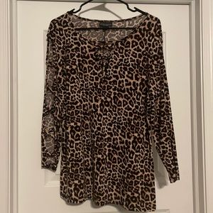 Leopard print blouse with edgy arm openings
